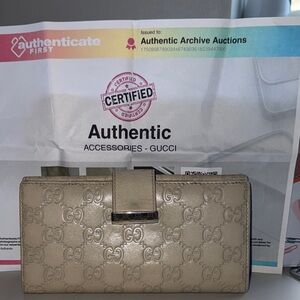 Gucci Gold Embossed Wallet comes with COA certificate